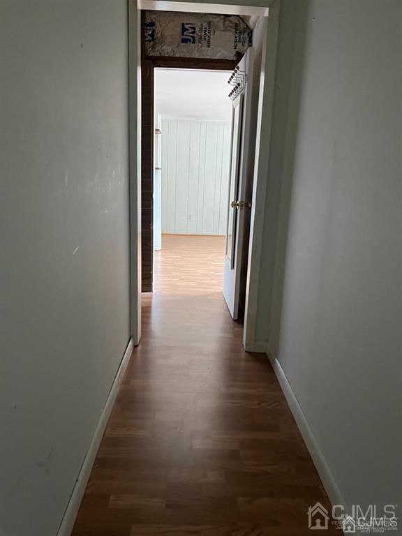 432 Oak Ridge Road Clark, NJ 07066 - Photo 17 of 25 a view of a hallway with wooden floor