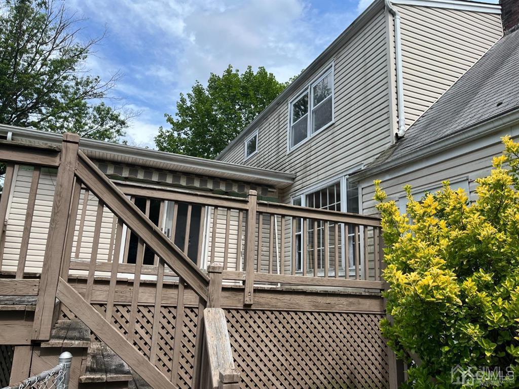 432 Oak Ridge Road Clark, NJ 07066 - Photo 20 of 25 a view of deck with large trees and wooden floor