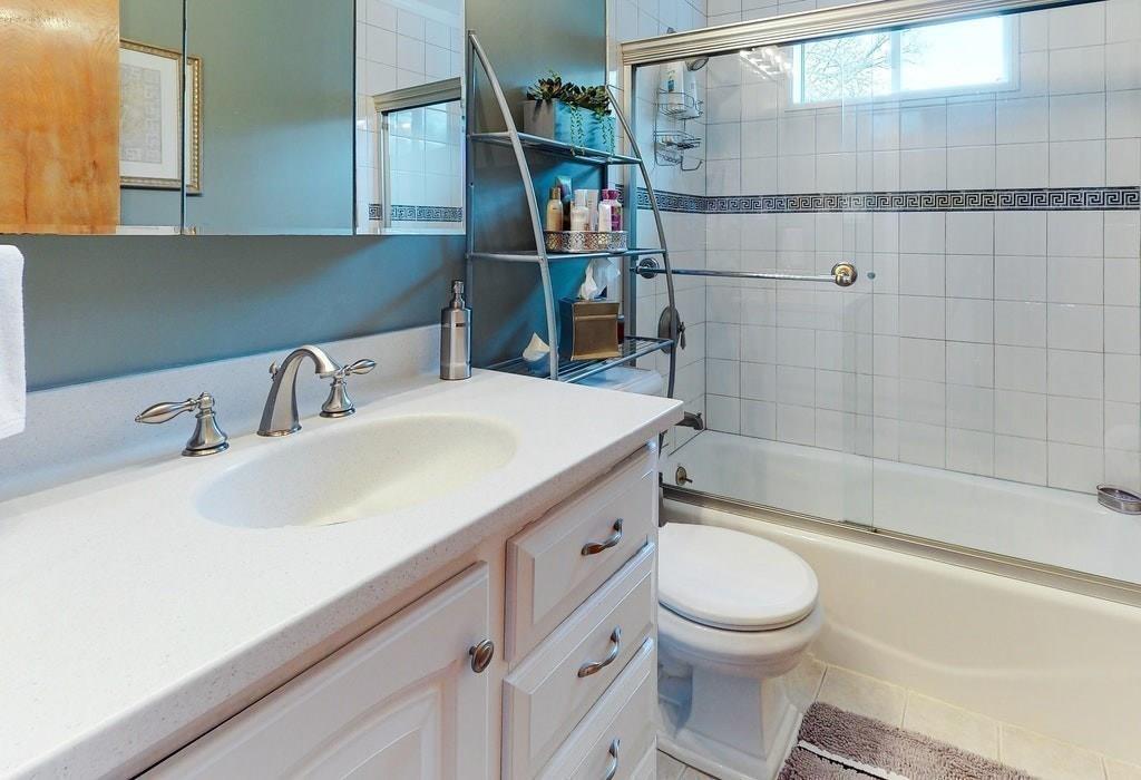 2 Wadsworth Road Arlington, MA 02476 - Photo 13 of 24 a bathroom with a sink a toilet and shower