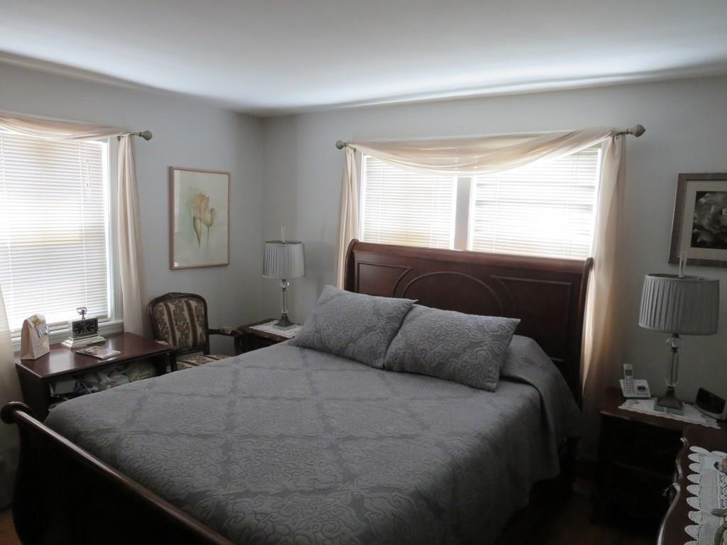 2 Wadsworth Road Arlington, MA 02476 - Photo 8 of 24 a bedroom with a bed and window