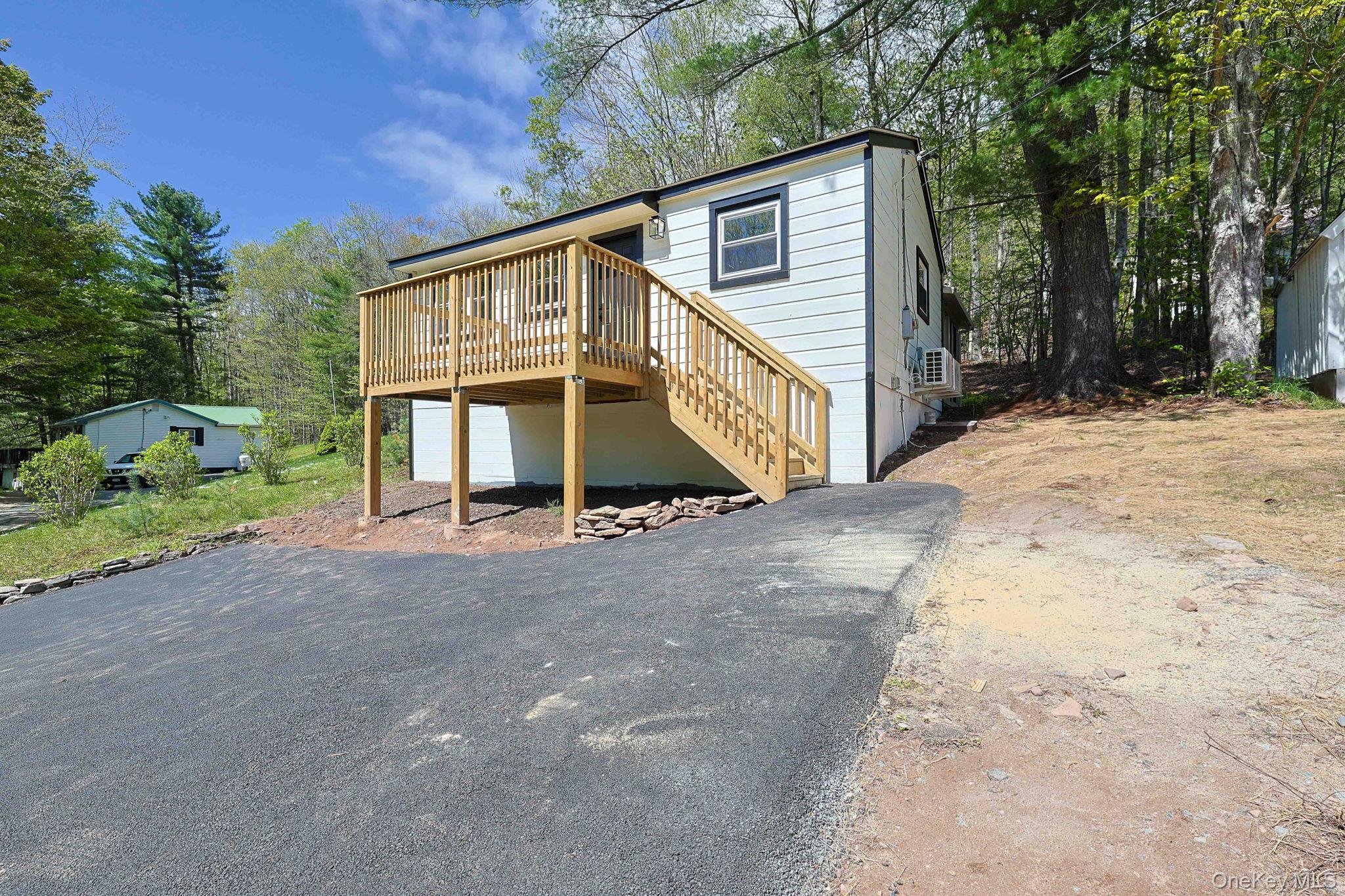 25 Overlook Road Woodbourne, NY 12788 - Photo 17 of 22 a view of a house with a yard