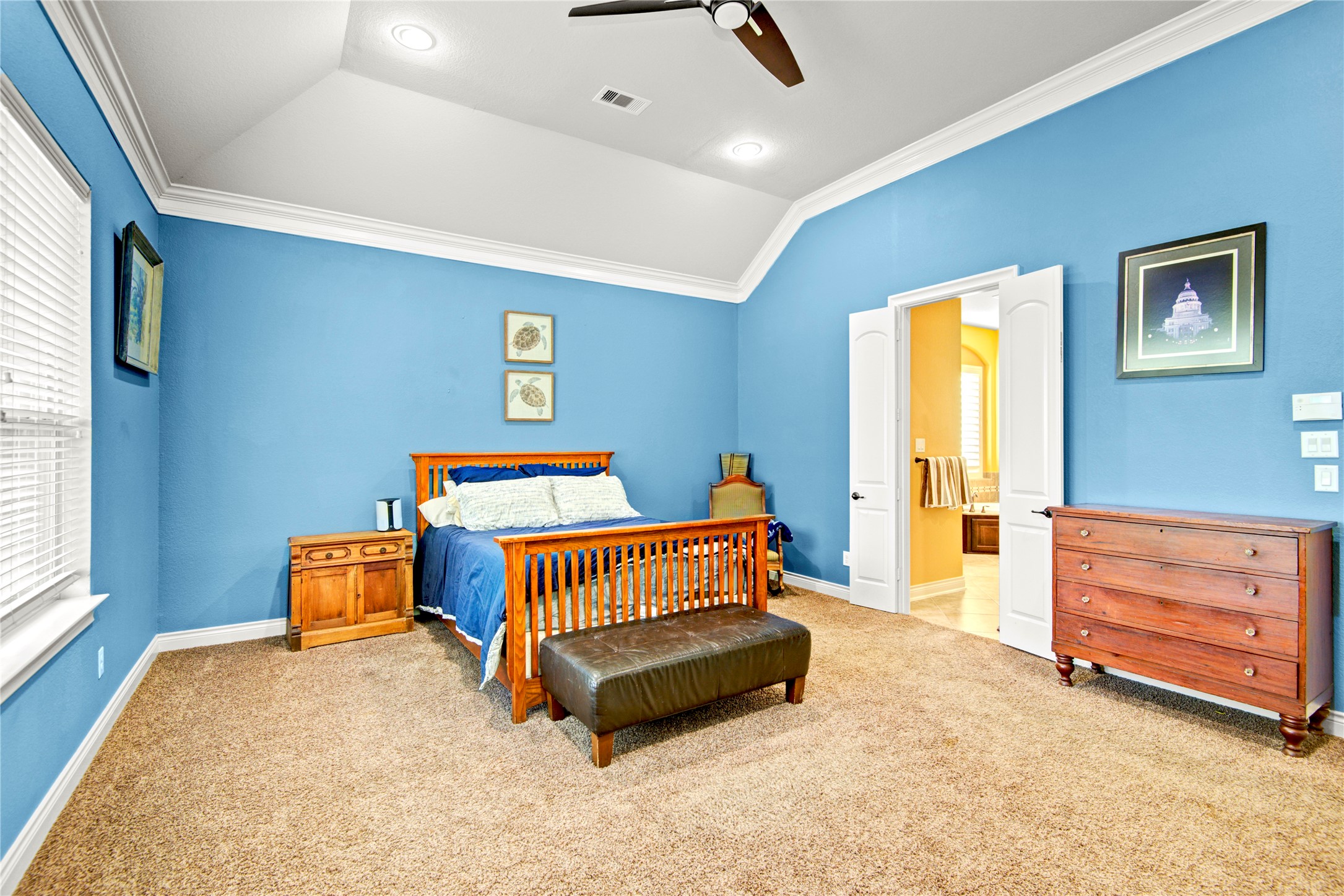 4315 Sanctuary Halls Spring, TX 77388 - Photo 38 of 50 a bedroom with a bed and a dresser