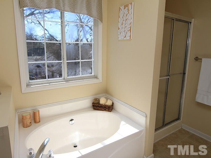 2109 Timken Court Raleigh, NC 27604 - Photo 14 of 21 a bathroom with a tub