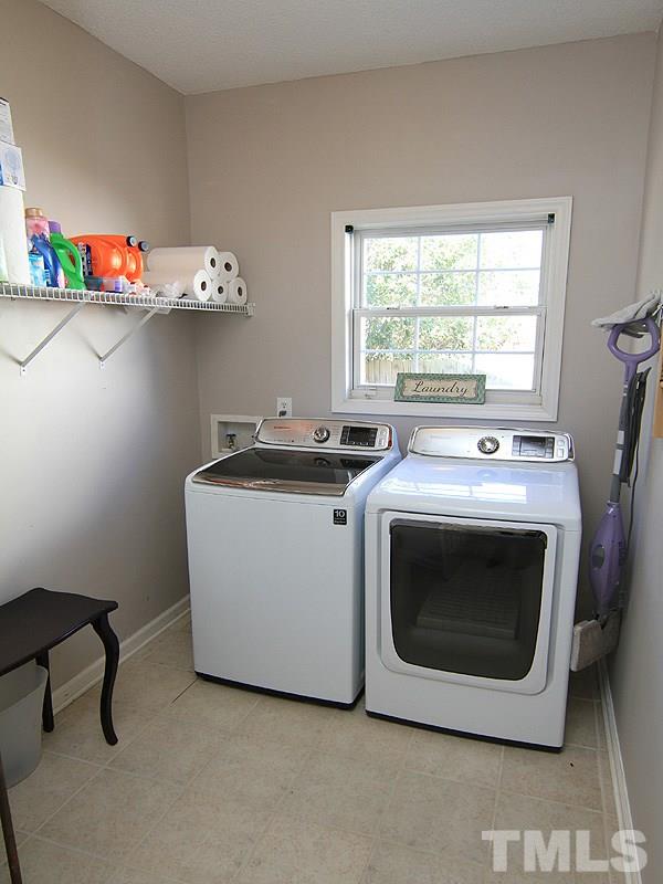 2109 Timken Court Raleigh, NC 27604 - Photo 18 of 21 a utility room with washer and dryer