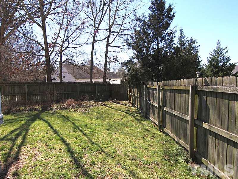 2109 Timken Court Raleigh, NC 27604 - Photo 3 of 21 a view of swimming pool with wooden fence