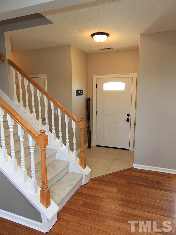 2109 Timken Court Raleigh, NC 27604 - Photo 4 of 21 a view of an entryway with wooden floor