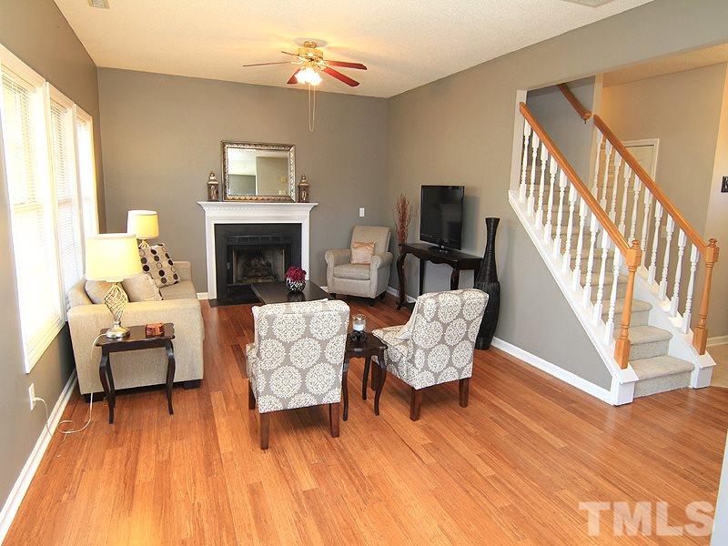 2109 Timken Court Raleigh, NC 27604 - Photo 6 of 21 a living room with furniture and a fireplace