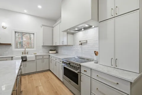 a picture of a bathroom with a shower