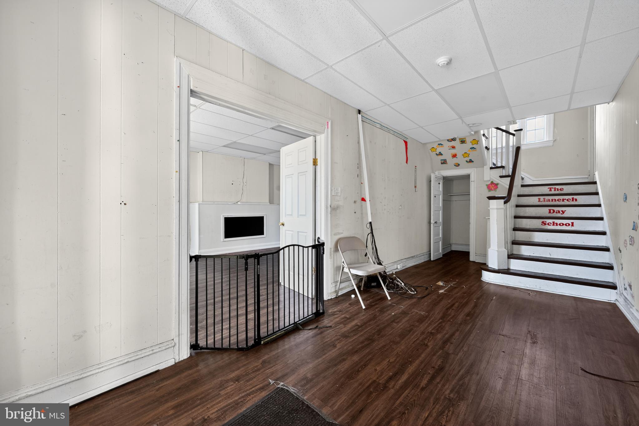 223 East Park Road Havertown, PA 19083 - Photo 18 of 43 a view of a livingroom with wooden floor and stairs
