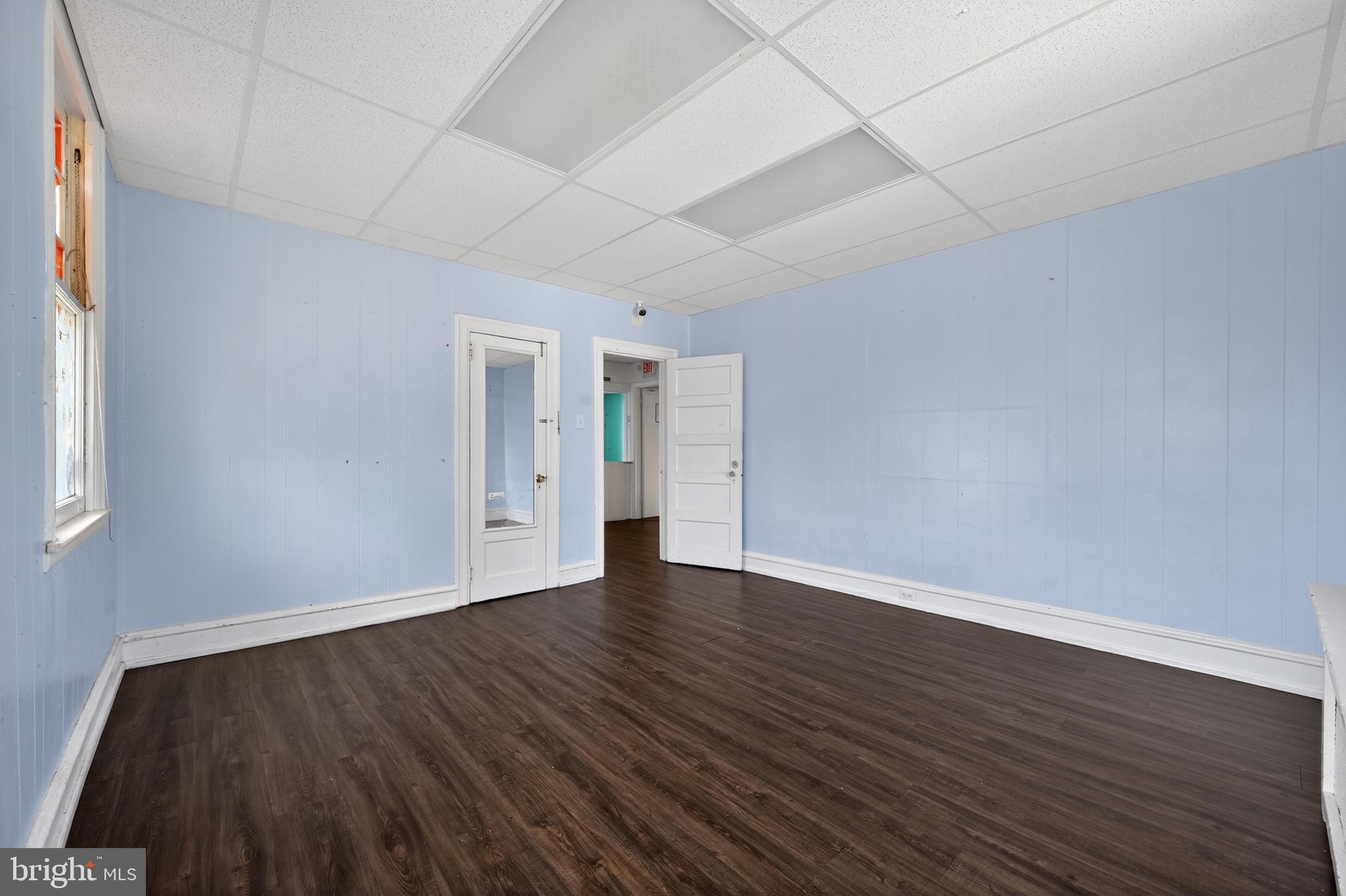 223 East Park Road Havertown, PA 19083 - Photo 19 of 43 a view of an empty room with wooden and a window