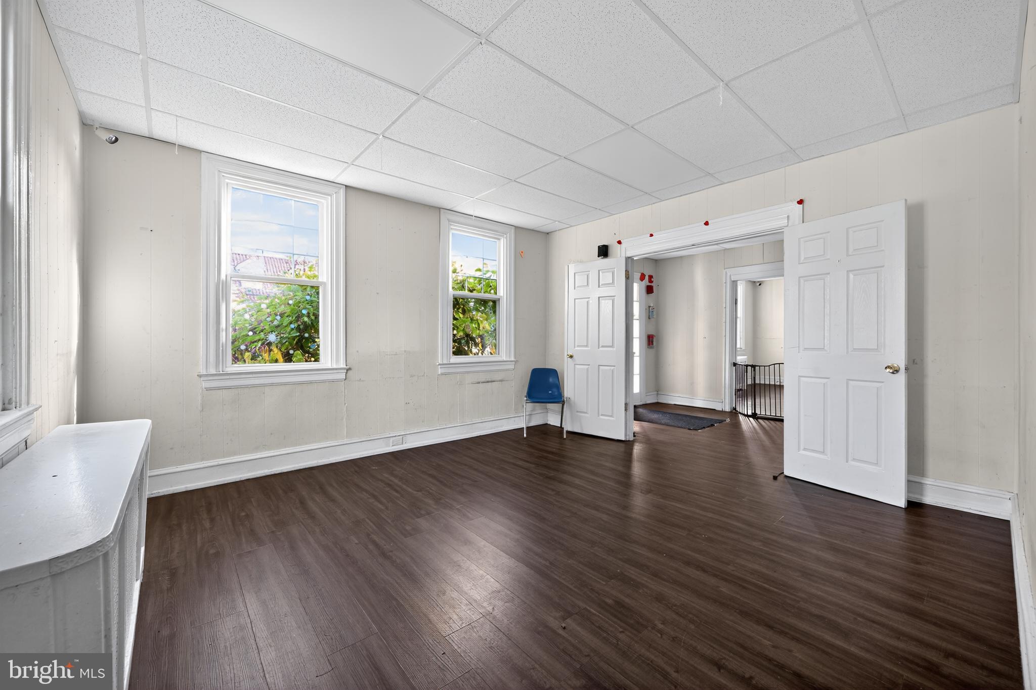 223 East Park Road Havertown, PA 19083 - Photo 20 of 43 a view of an empty room with wooden floor and a window