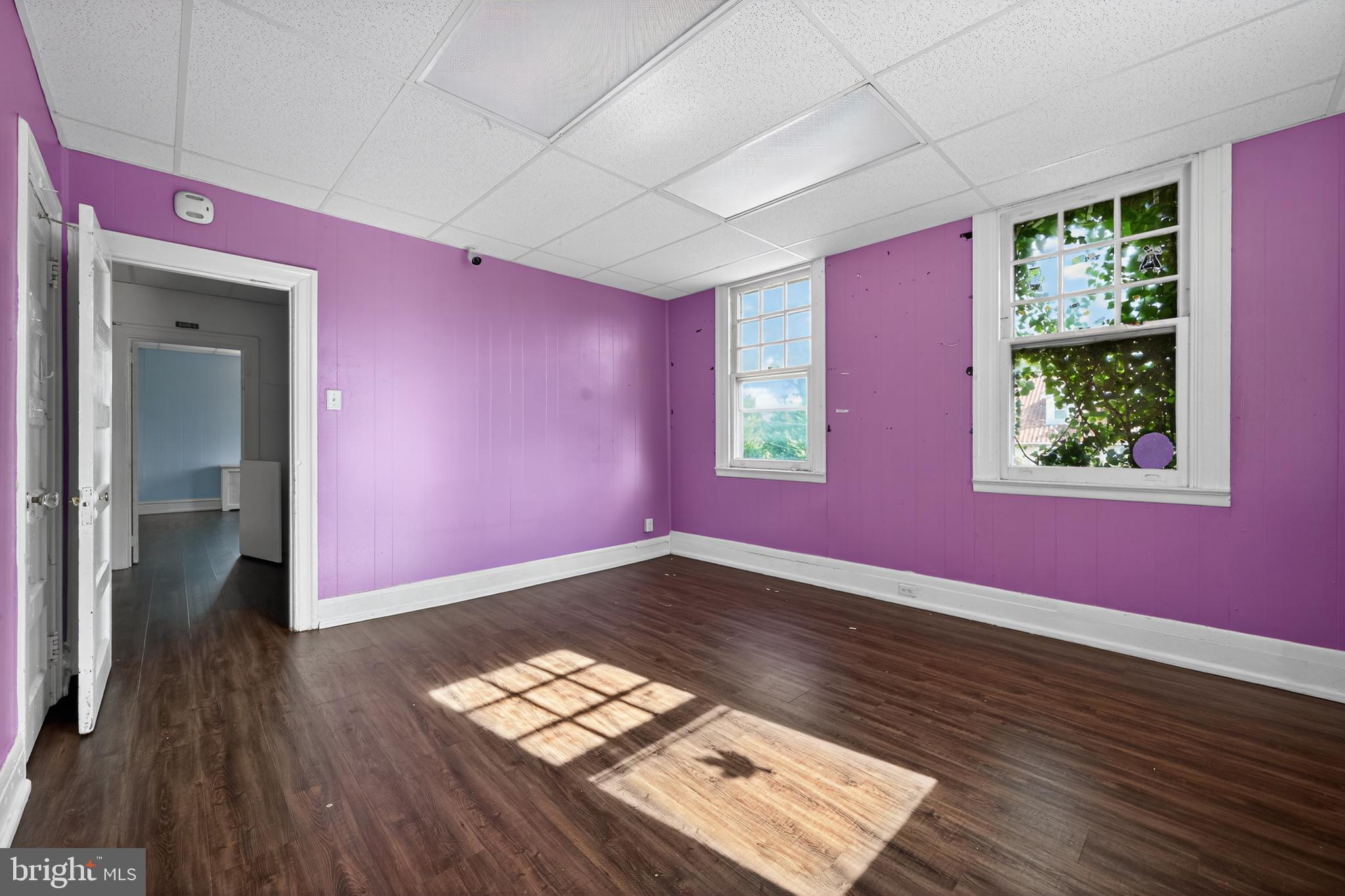 223 East Park Road Havertown, PA 19083 - Photo 21 of 43 a view of empty room with wooden floor and fan