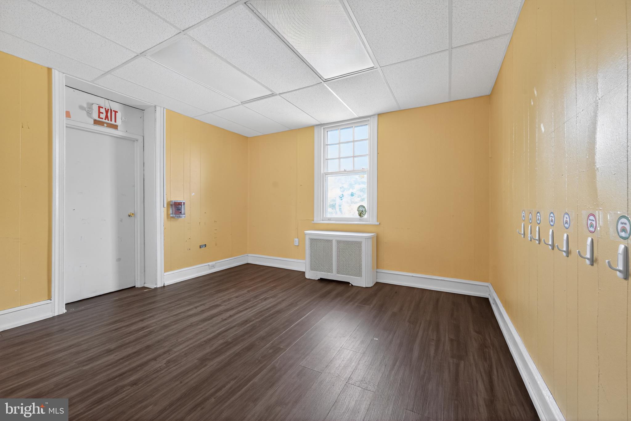 223 East Park Road Havertown, PA 19083 - Photo 26 of 43 a view of a big room with wooden floor and windows