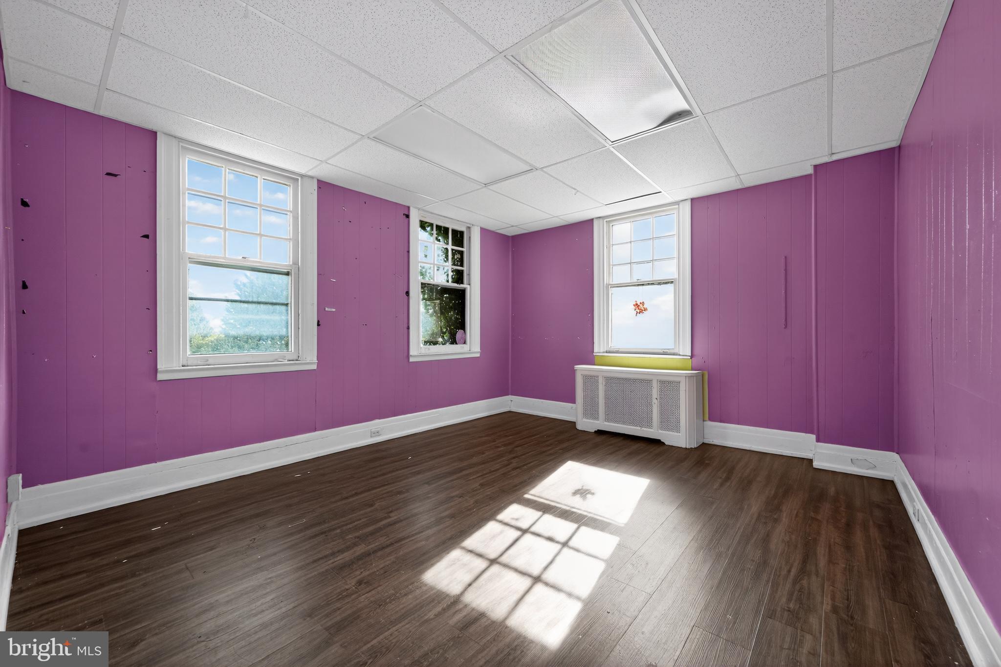 223 East Park Road Havertown, PA 19083 - Photo 27 of 43 a view of an empty room with a window and wooden floor