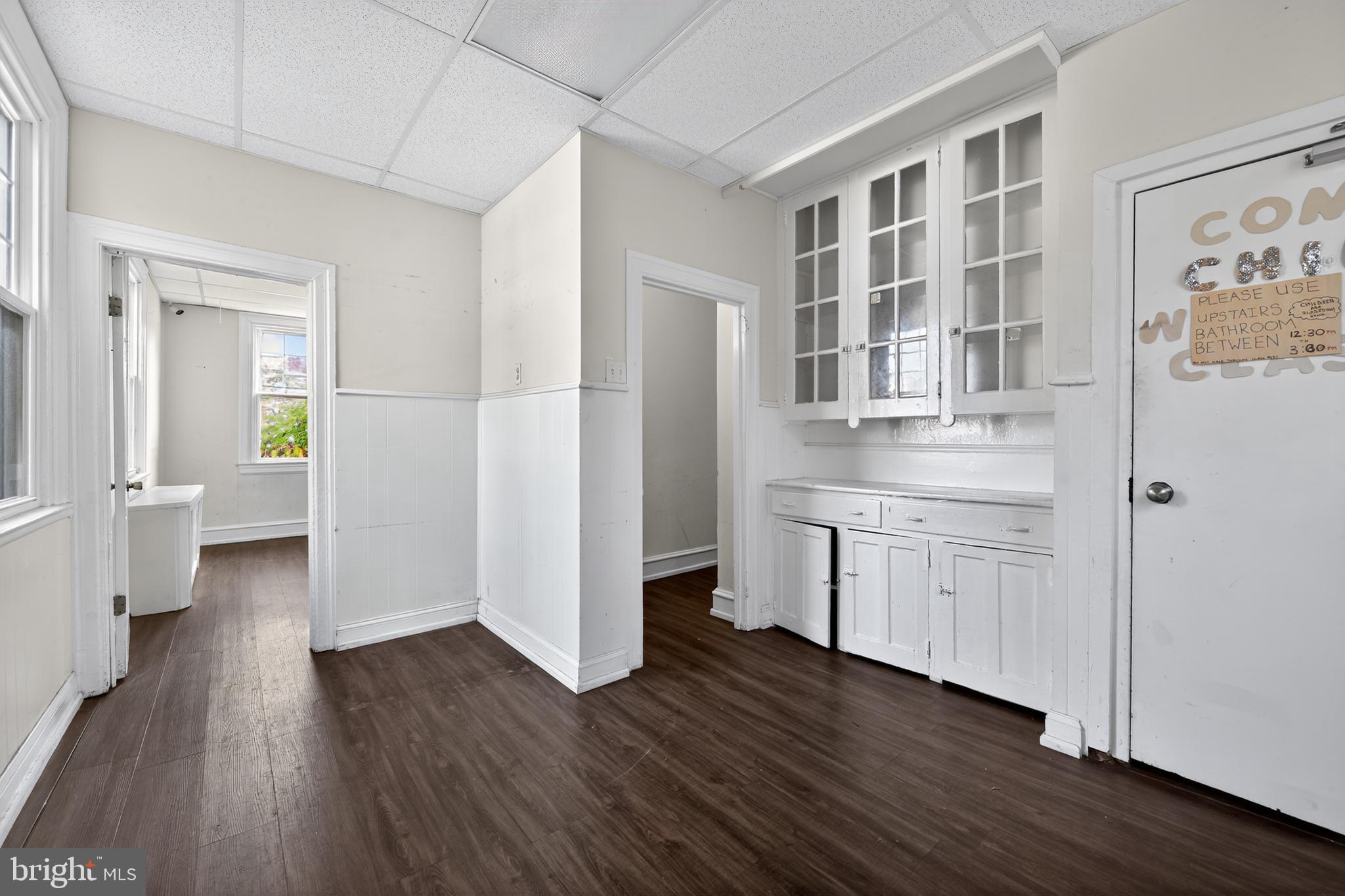 223 East Park Road Havertown, PA 19083 - Photo 30 of 43 a kitchen with a wooden floor and cabinets