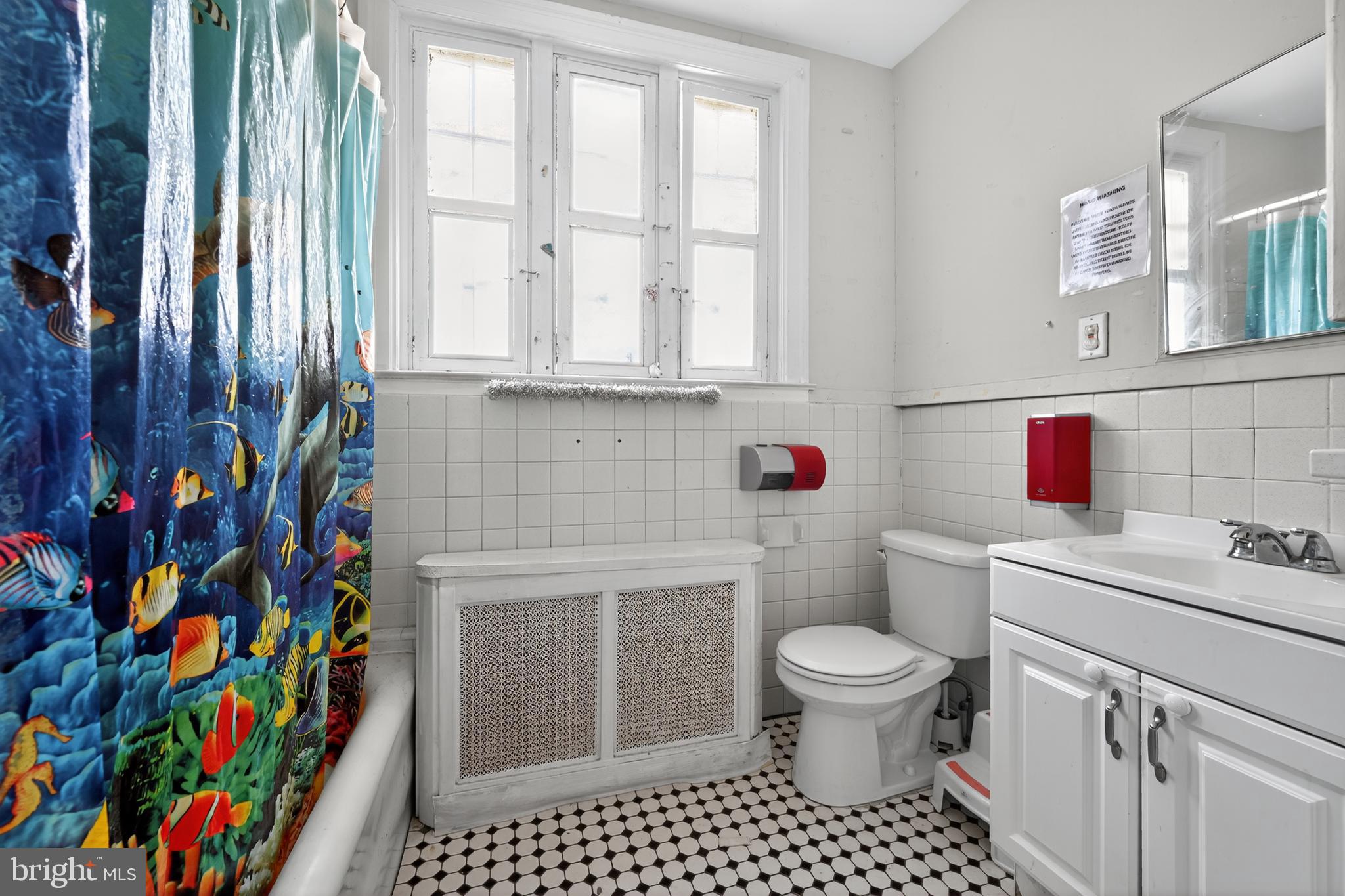 223 East Park Road Havertown, PA 19083 - Photo 33 of 43 a bathroom with a sink toilet vanity and window