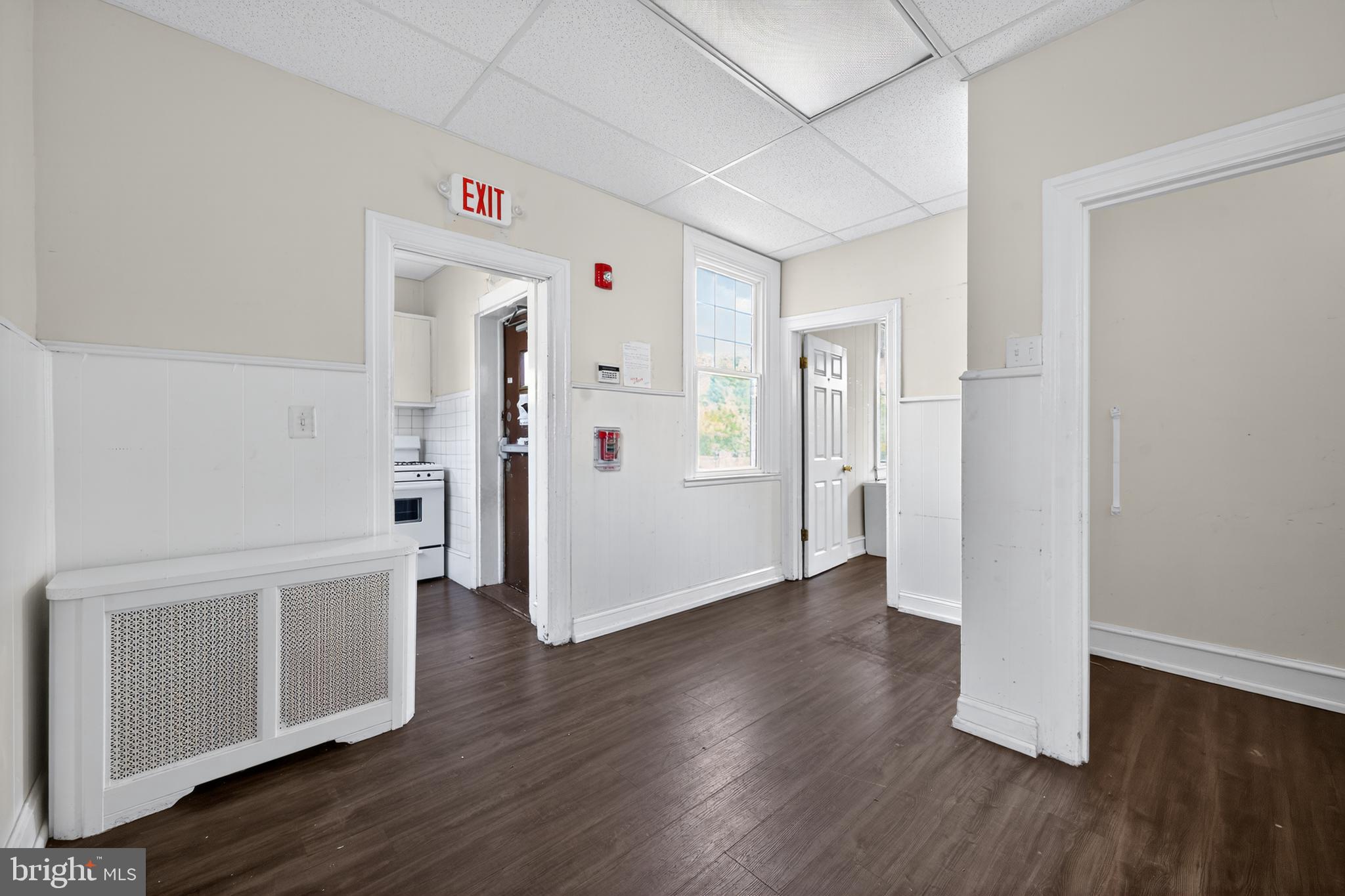 223 East Park Road Havertown, PA 19083 - Photo 34 of 43 a view of an empty room with wooden floor