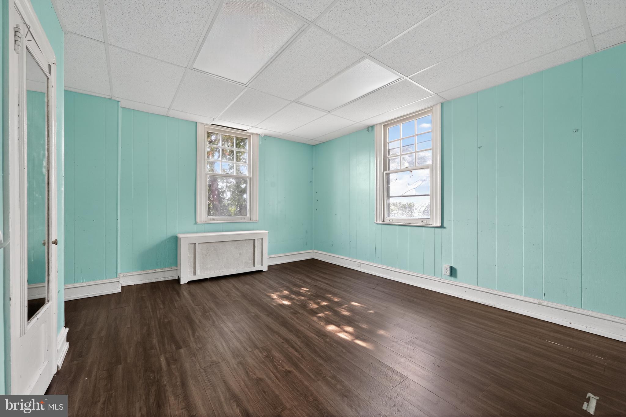 223 East Park Road Havertown, PA 19083 - Photo 41 of 43 an empty room with wooden floor closet and windows