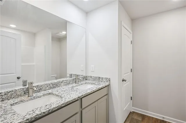 a bathroom with a bathtub and a toilet