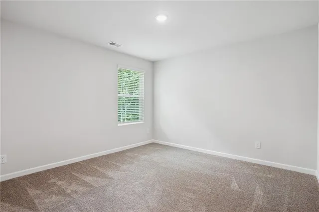 a view of a room that has a window in it