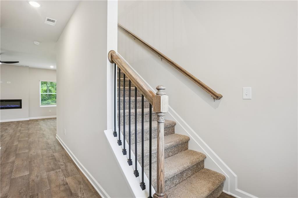 685 Egrets Landing, Unit 58 Covington, GA 30014 - Photo 4 of 41 a view of entryway and hall with wooden floor