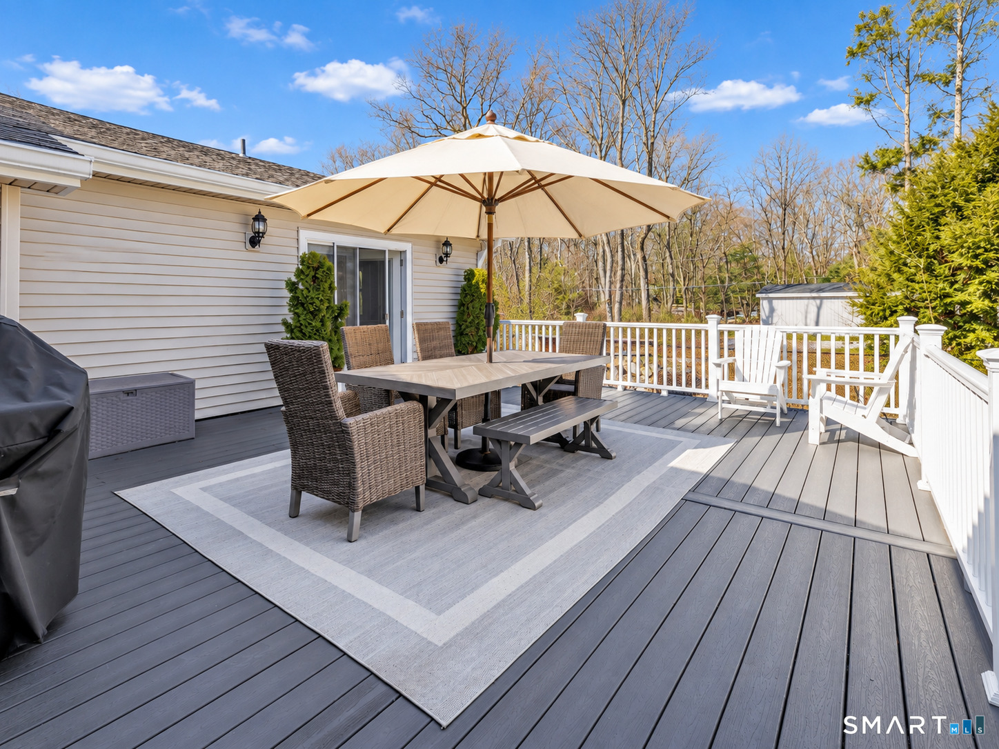 27 Old Quarry Road Woodbridge, CT 06525 - Photo 6 of 40 Deck off Living Room & Primary Bedroom