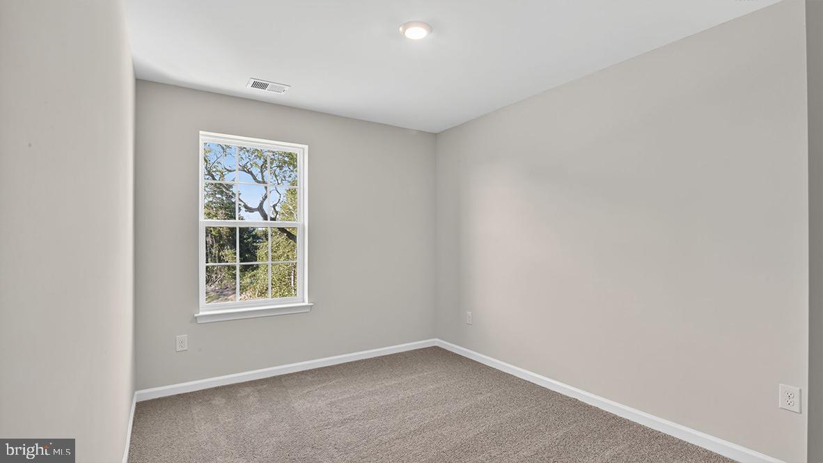 204 Bentz Avenue Villas, NJ 08251 - Photo 19 of 22 an empty room with windows