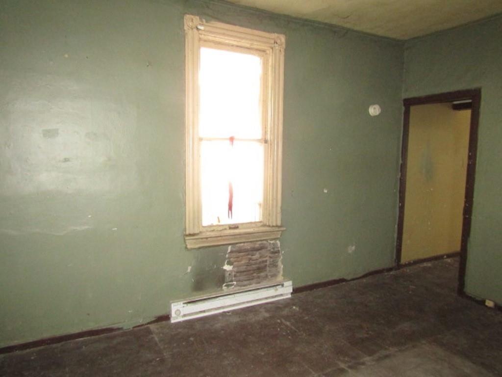 1817 4th Avenue Beaver Falls, PA 15010 - Photo 12 of 33 an empty room with a window