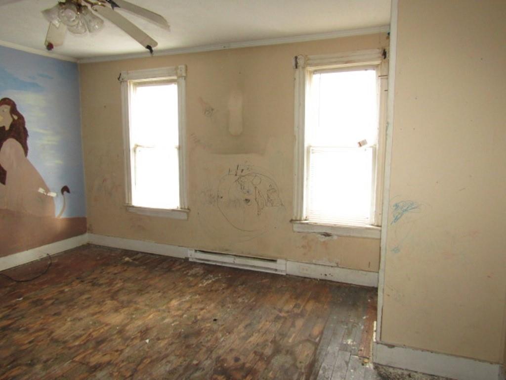 1817 4th Avenue Beaver Falls, PA 15010 - Photo 18 of 33 an empty room with a window