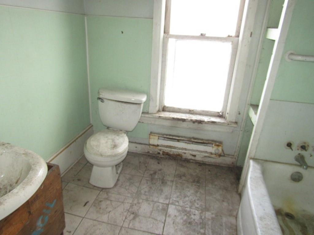 1817 4th Avenue Beaver Falls, PA 15010 - Photo 26 of 33 a bathroom with a toilet and a sink
