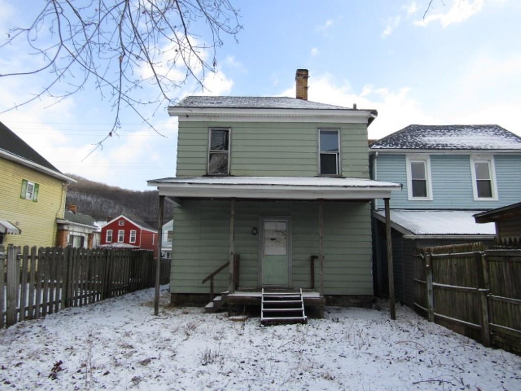 1817 4th Avenue Beaver Falls, PA 15010 - Photo 5 of 33 a front view of a house with parking space