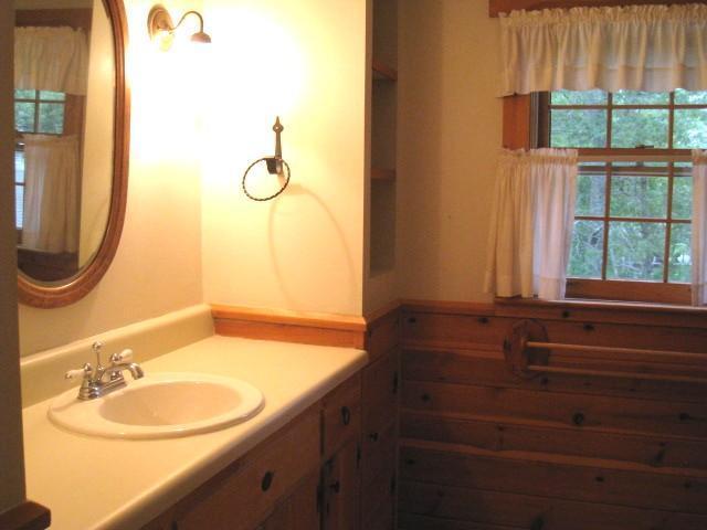 20 Farm Hill Road Centerville, MA 02632 - Photo 17 of 33 a bathroom with a sink and a mirror