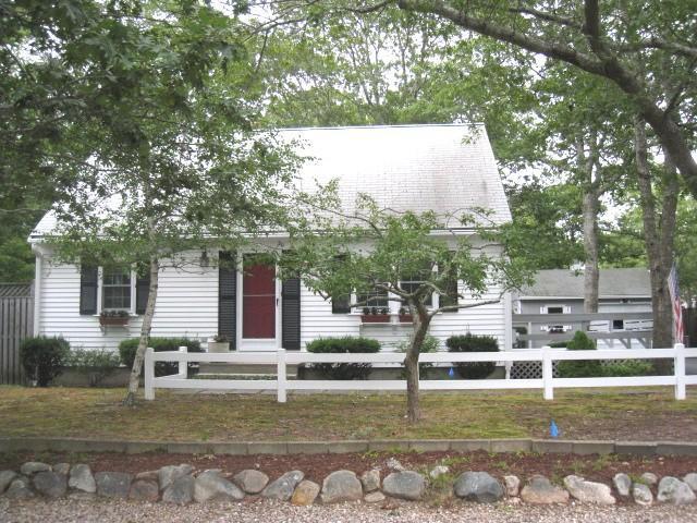 20 Farm Hill Road Centerville, MA 02632 - Photo 2 of 33 a house view with swimming pool in front of it