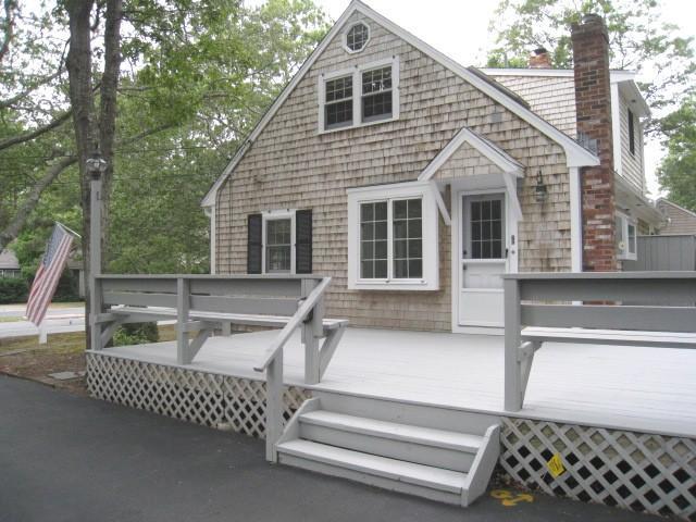 20 Farm Hill Road Centerville, MA 02632 - Photo 3 of 33 a front view of a house with a couch