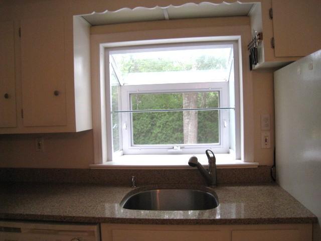 20 Farm Hill Road Centerville, MA 02632 - Photo 5 of 33 a kitchen with a sink cabinets and a window