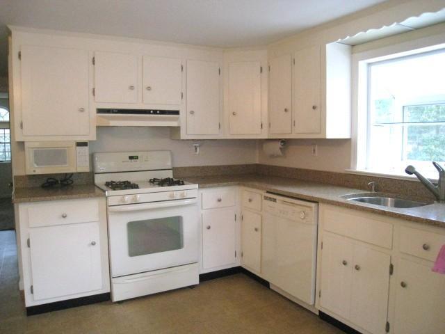 20 Farm Hill Road Centerville, MA 02632 - Photo 6 of 33 a kitchen with cabinets appliances a sink and a window