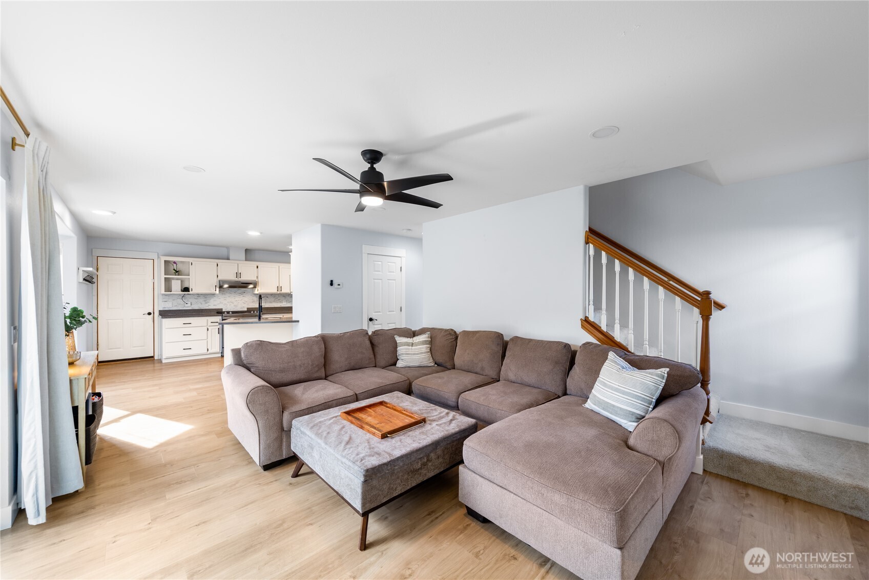 1608 Southwest Union Street Oak Harbor, WA 98277 - Photo 14 of 40 a living room with furniture and a wooden floor