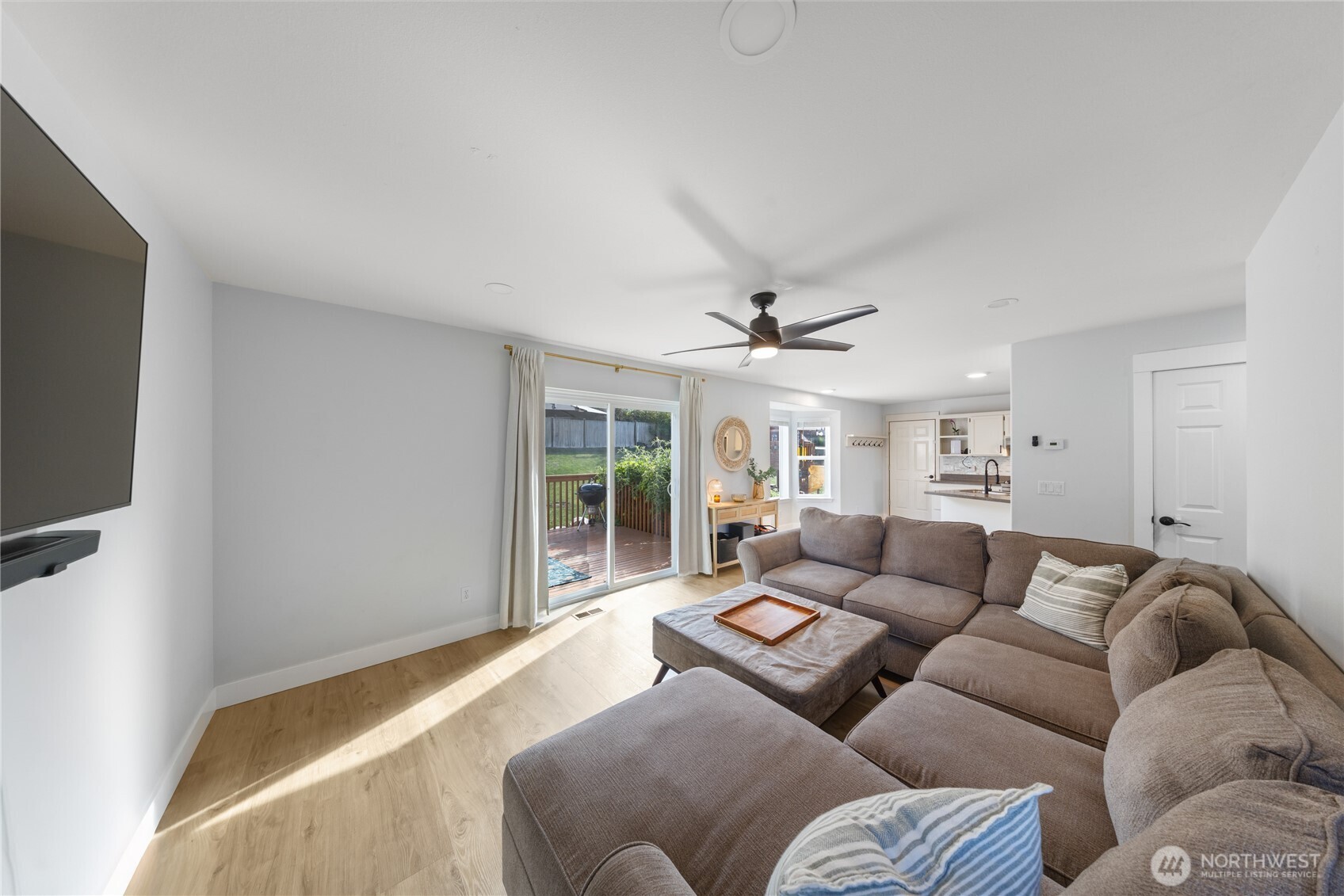 1608 Southwest Union Street Oak Harbor, WA 98277 - Photo 15 of 40 a living room with furniture and a flat screen tv