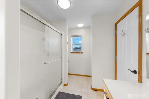 a view of a bedroom with bathroom