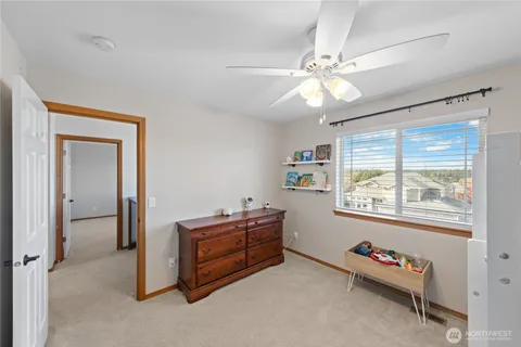 a room with furniture and a window