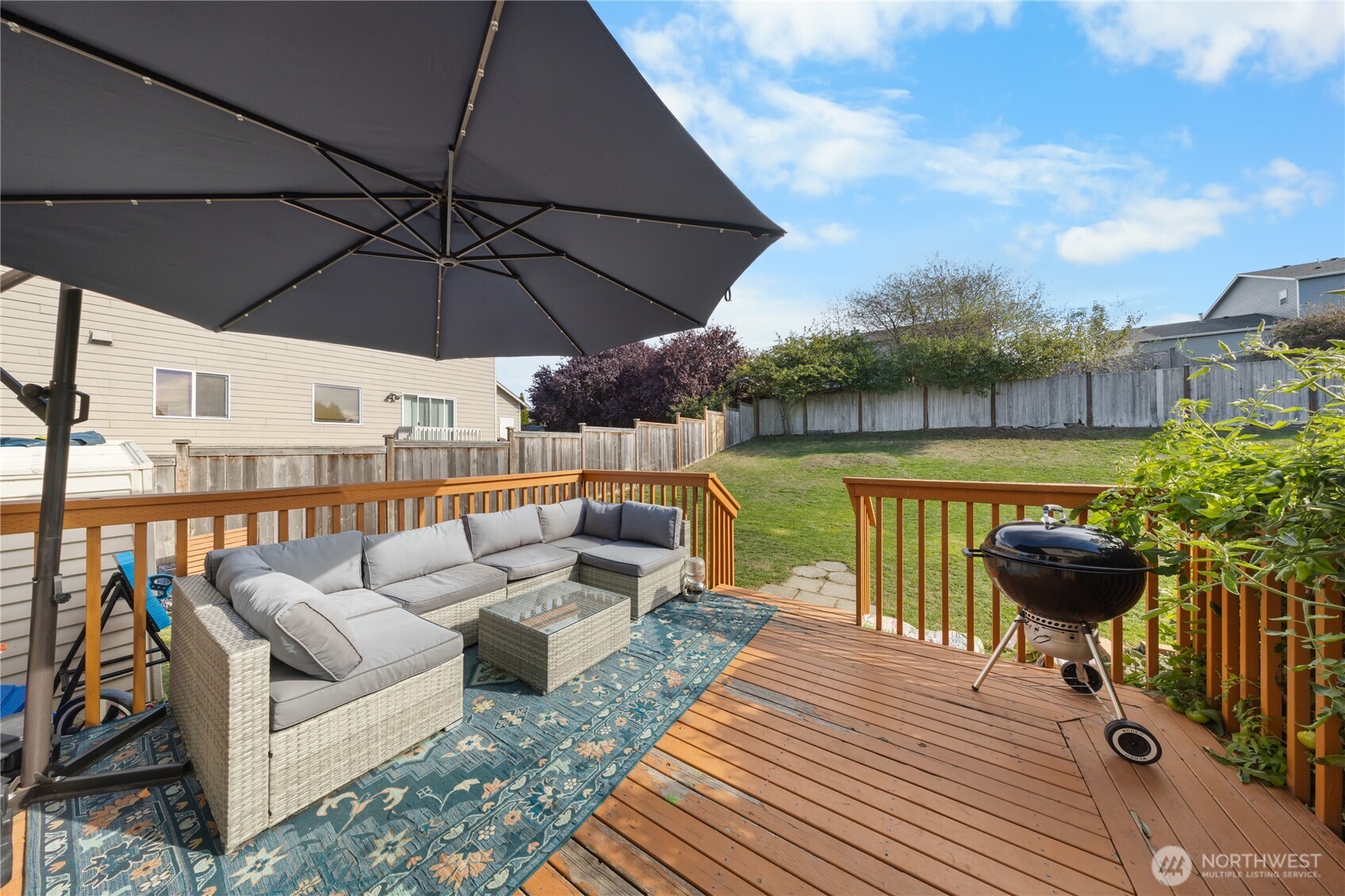 1608 Southwest Union Street Oak Harbor, WA 98277 - Photo 32 of 40 a view of a swimming pool with a couches in a patio