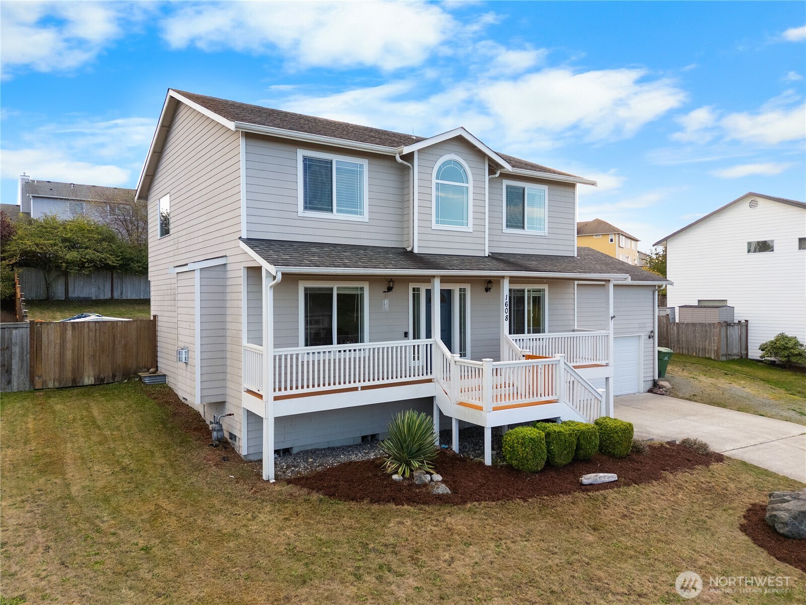 1608 Southwest Union Street Oak Harbor, WA 98277 - Photo 39 of 40 a front view of a house with garden