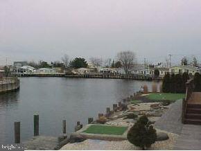 209 Peter Road Manahawkin, NJ 08050 - Photo 4 of 10 a view of a lake