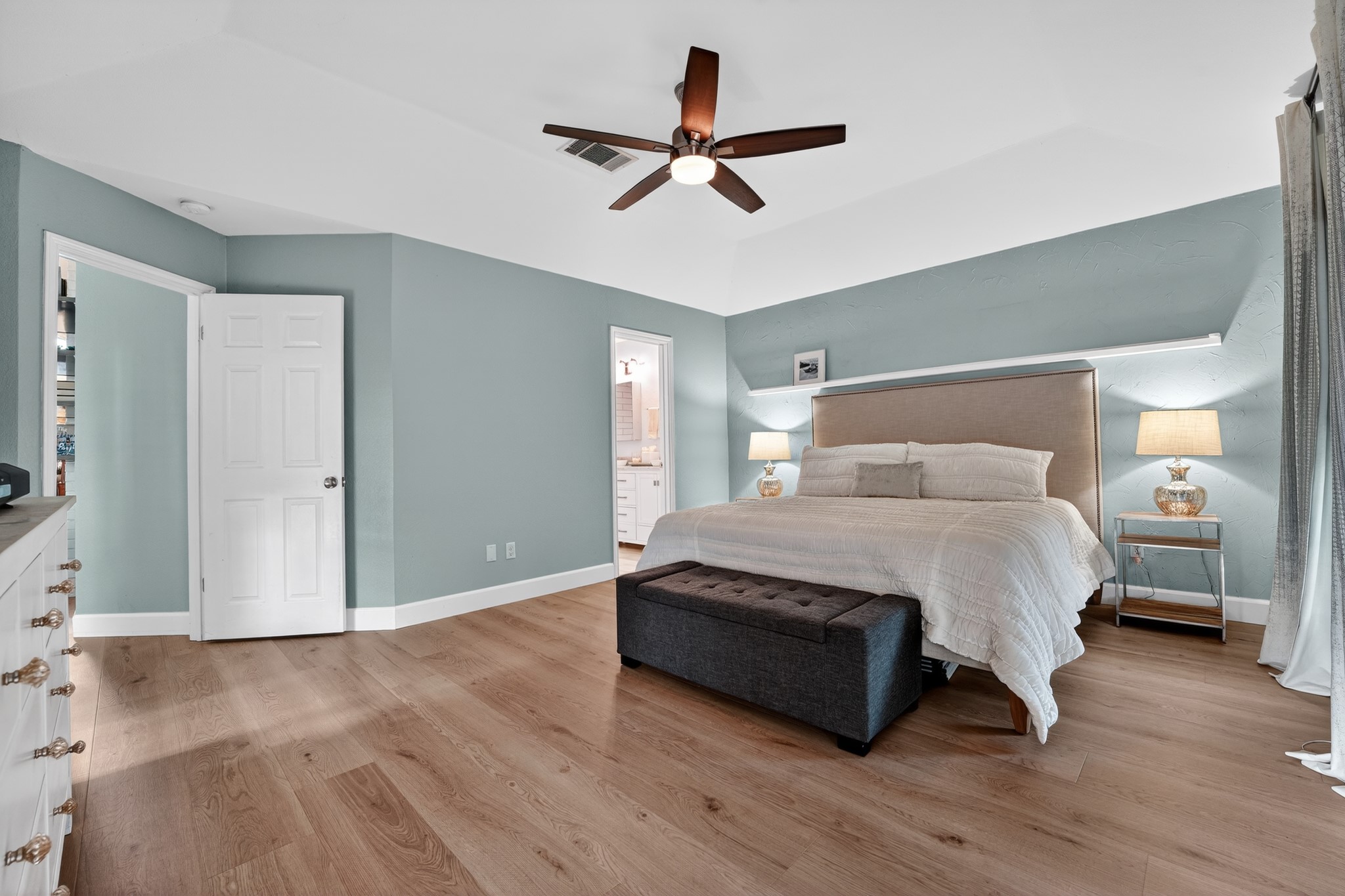 1811 Old Mill Road Cedar Park, TX 78613 - Photo 21 of 39 A comforting retreat featuring wood-like flooring and a ceiling fan, perfect for unwinding.