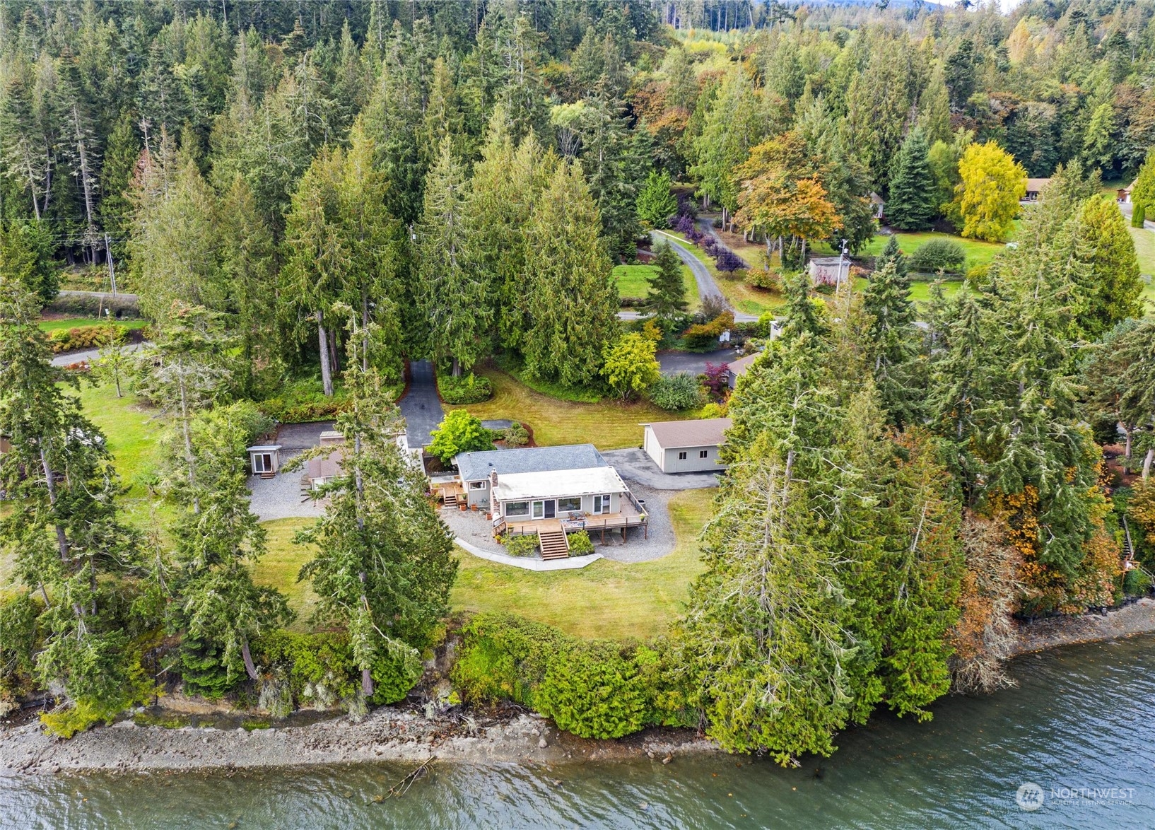 3217 West Sequim Bay Road Sequim, WA 98382 - Photo 1 of 40 a view of a swimming pool with an outdoor space