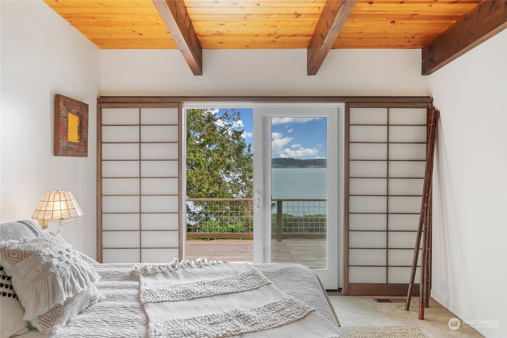 3217 West Sequim Bay Road Sequim, WA 98382 - Photo 15 of 40 a bedroom with a bed and window