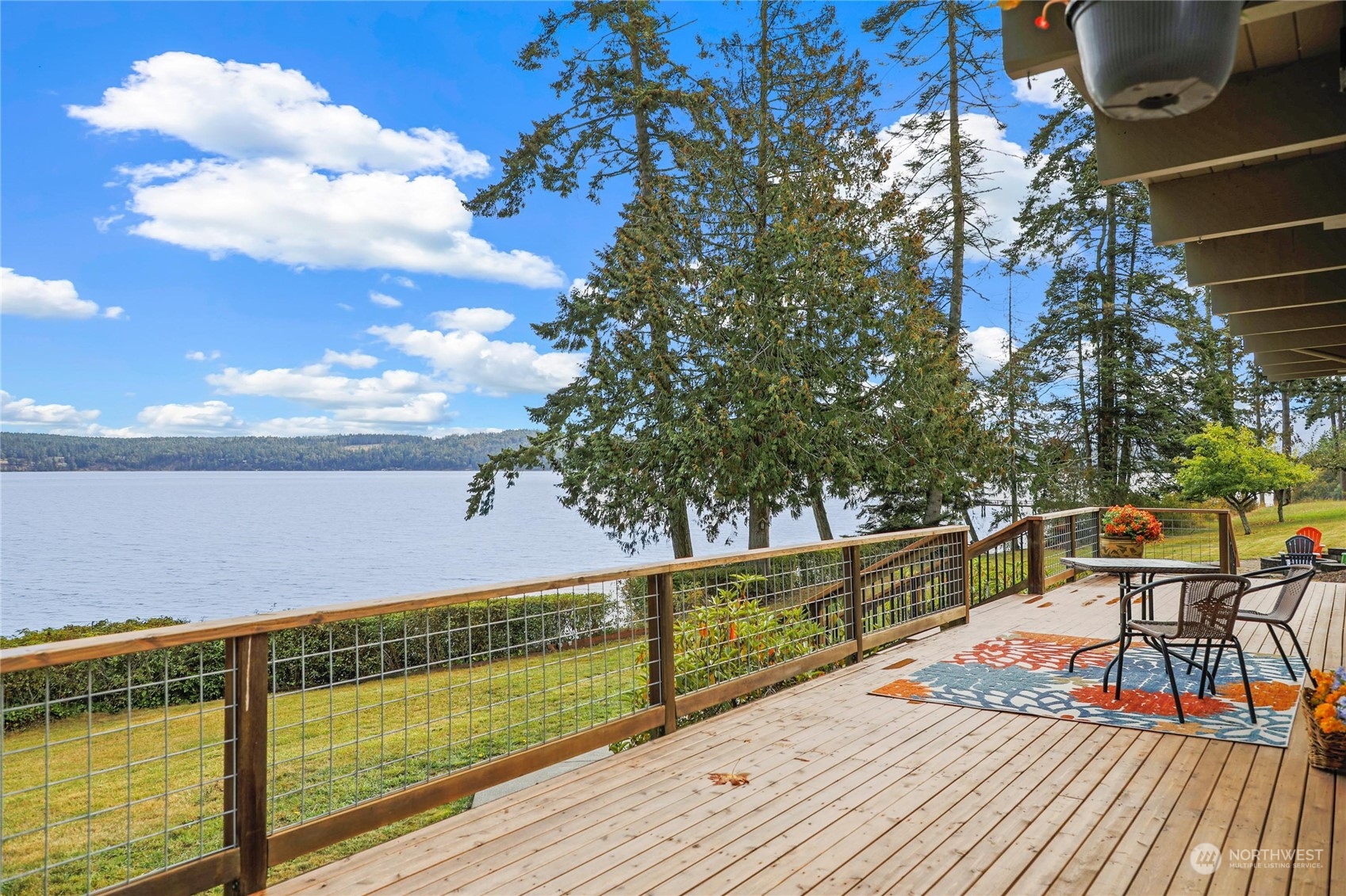 3217 West Sequim Bay Road Sequim, WA 98382 - Photo 16 of 40 a view of a balcony with chairs