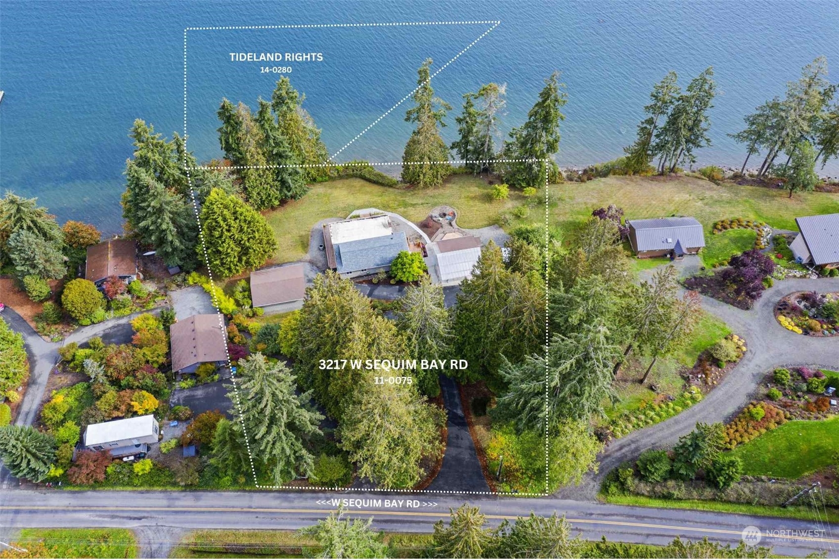 3217 West Sequim Bay Road Sequim, WA 98382 - Photo 2 of 40 an aerial view of a house with a yard
