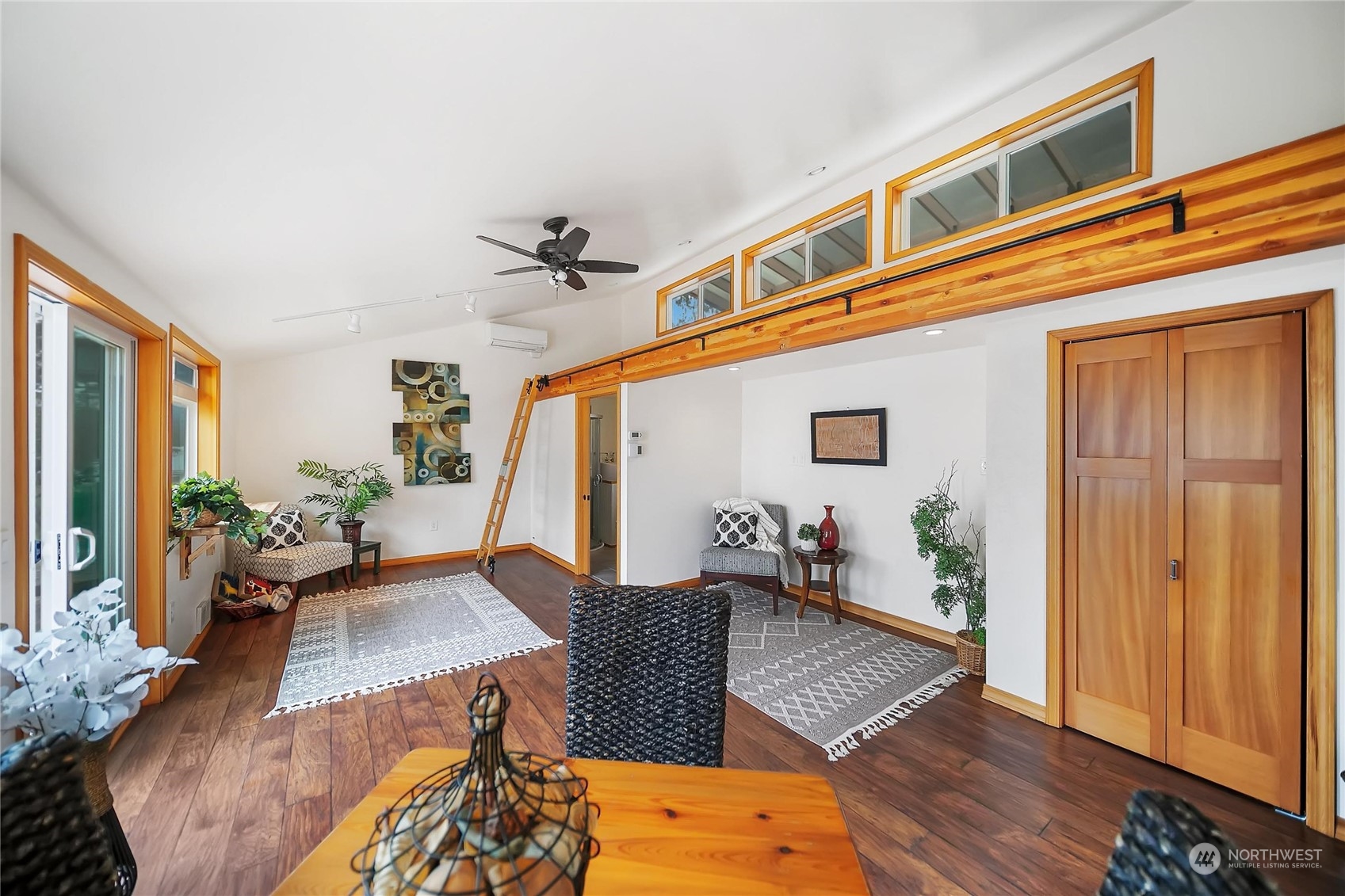 3217 West Sequim Bay Road Sequim, WA 98382 - Photo 29 of 40 a living room with furniture and wooden floor