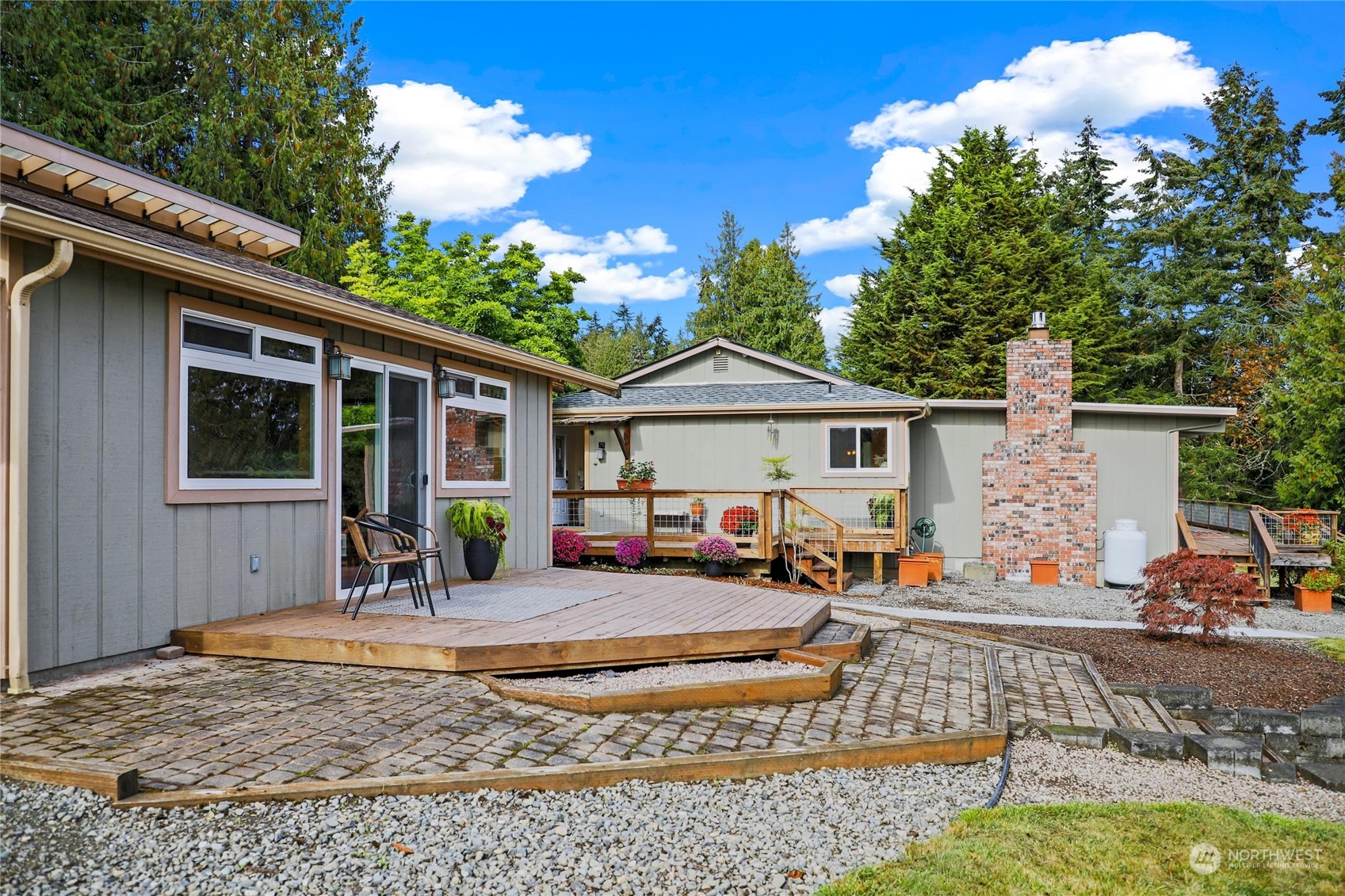 3217 West Sequim Bay Road Sequim, WA 98382 - Photo 32 of 40 a front view of a house with sitting area